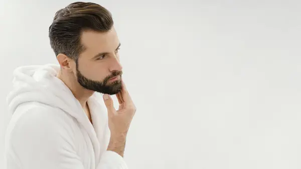 man-taking-good-care-his-hair-home